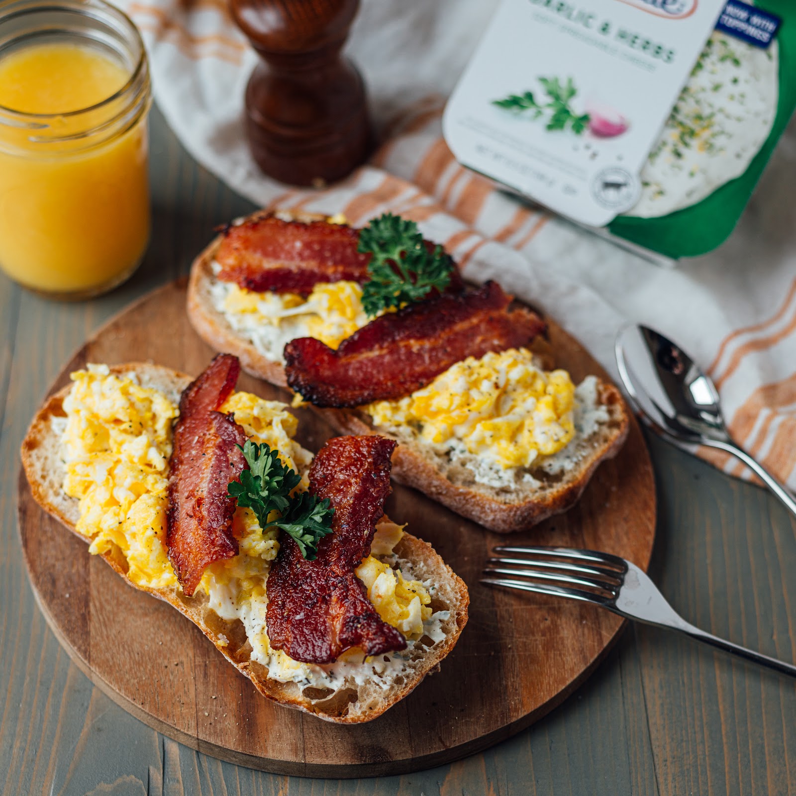toasts with alouette garlic and herbs, eggs and bacon