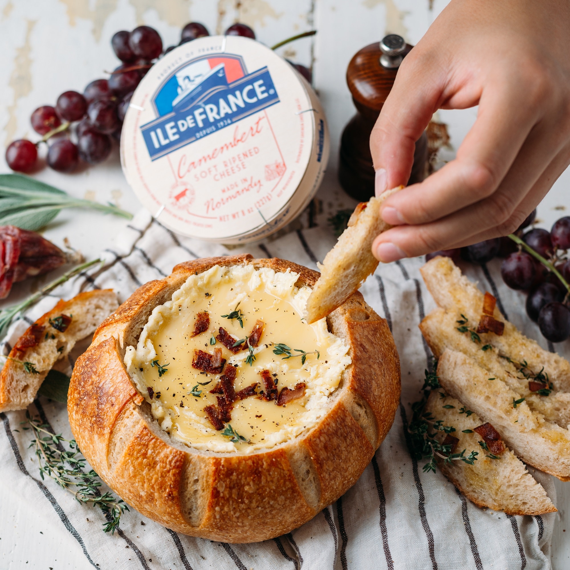 ile de france camembert dip in a bread loaf