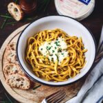 pasta dish with melted ile de france camembert